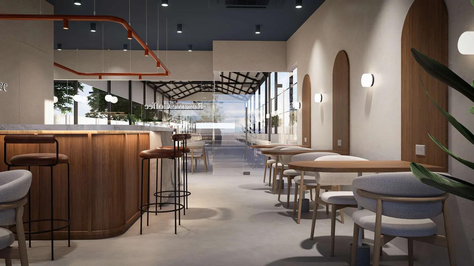 Render of the café seating beside arched windows, with the court hall's roof visible through the glass